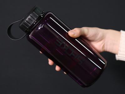 Botella de agua de tritán 34oz con tapa plana 